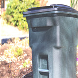 Toter's 64 gallon black garbage can with wheels and lid